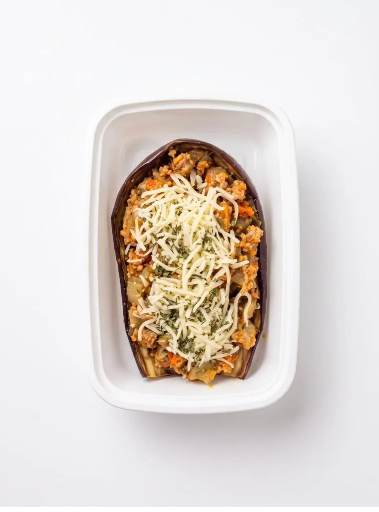 Berenjena rellena con queso gratinado